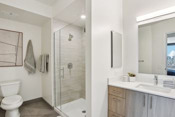 Designer tile flooring and backsplash in bathroom(s)